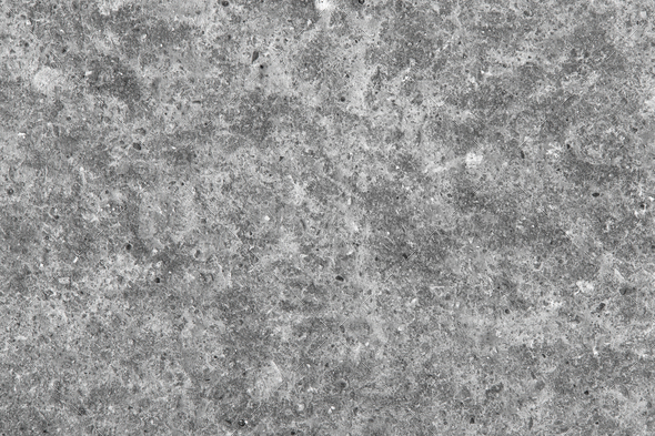 Dirty old concrete mixed with small gravel stones floor texture